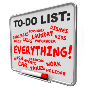 To Do List chores, tasks, work and projects written on a message board for an overburdened or stressed out life